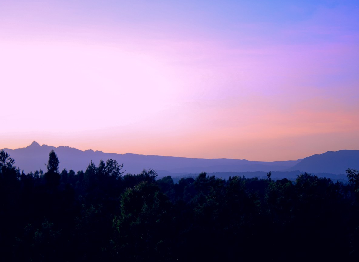Mount Kenya's silhouette at dusk seen from the Laikipia plateau